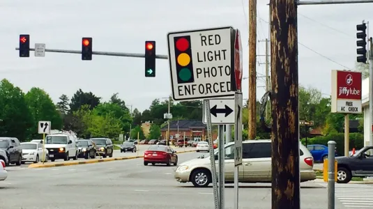 Can I contest a ticket issued by the Rowland St S Barranca Ave red light camera